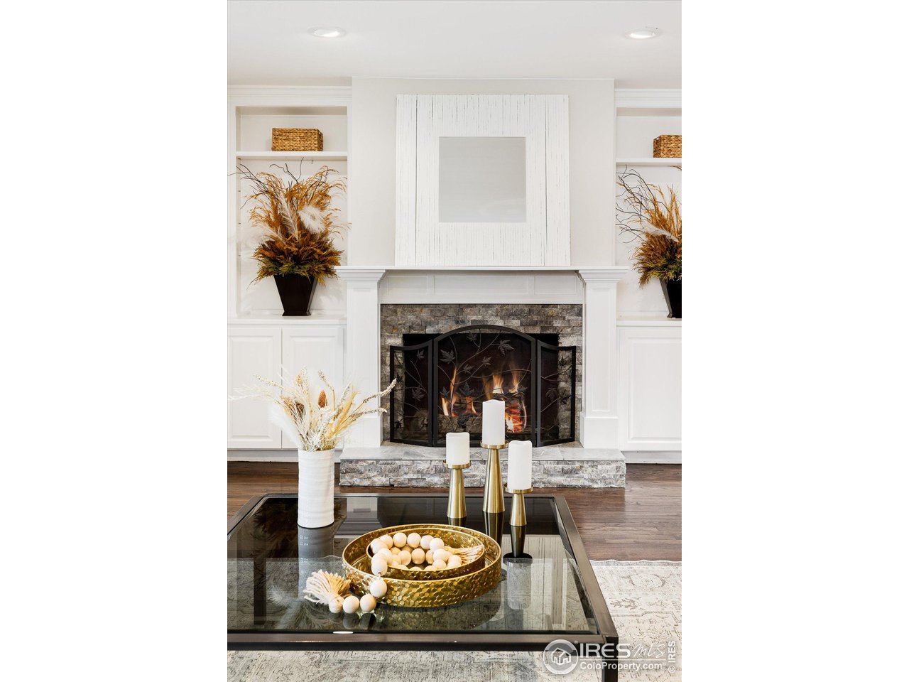 6919 Frying Pan Road Boulder, CO 80301 - Photo 12 of 36 a living room with furniture and a fireplace