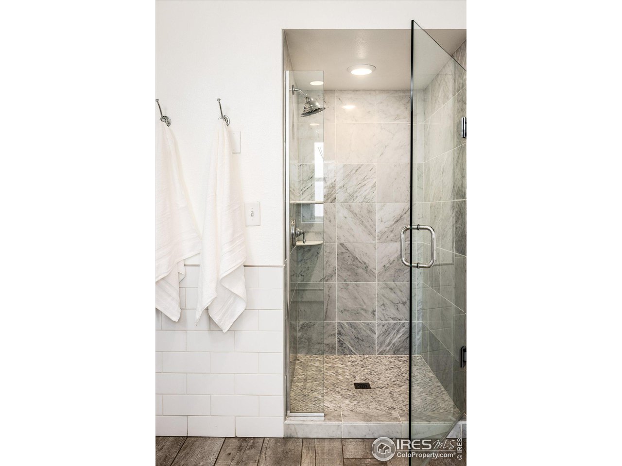 6919 Frying Pan Road Boulder, CO 80301 - Photo 18 of 36 a bathroom with a shower and a sink