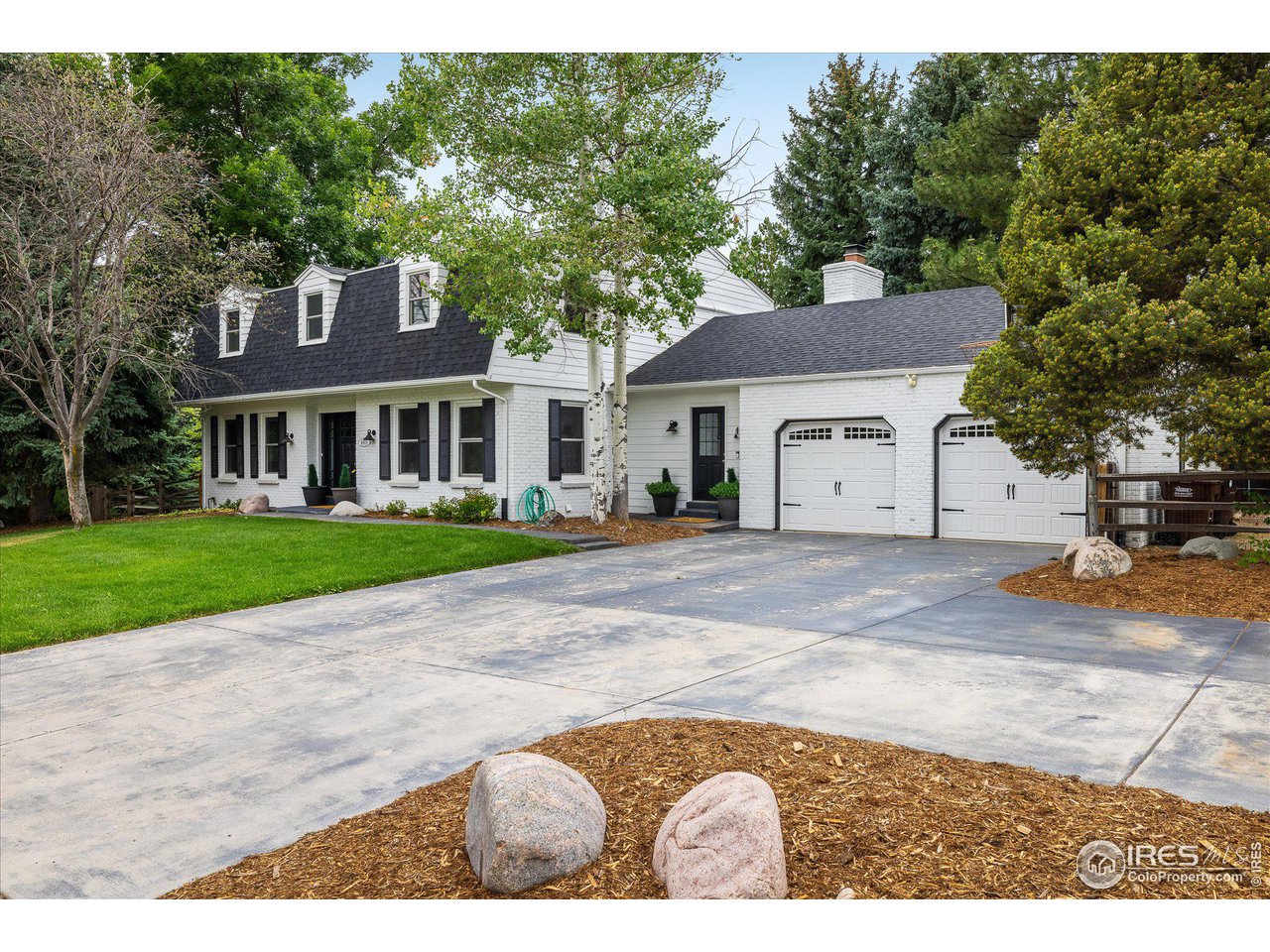 6919 Frying Pan Road Boulder, CO 80301 - Photo 2 of 36 a view of house with yard