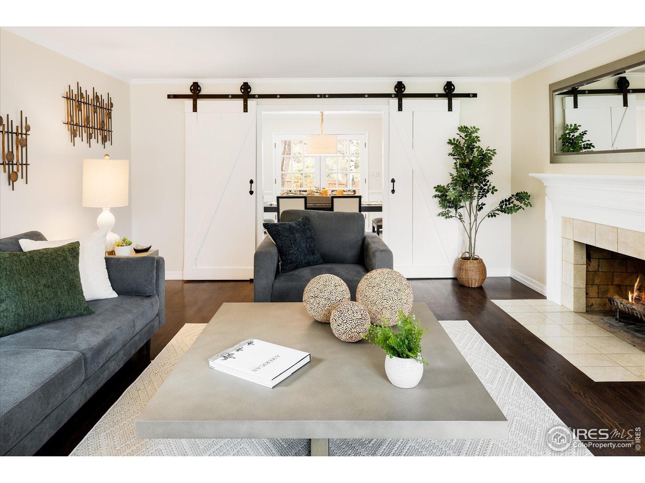 6919 Frying Pan Road Boulder, CO 80301 - Photo 3 of 36 a living room with furniture and a fireplace
