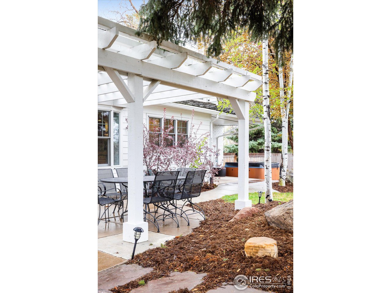 6919 Frying Pan Road Boulder, CO 80301 - Photo 33 of 36 a view of a room with a dining table and chairs