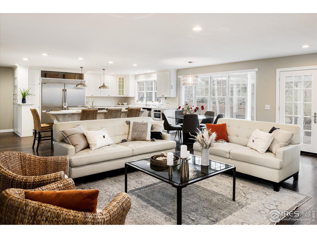 6919 Frying Pan Road Boulder, CO 80301 - Photo 10 of 36 a living room with furniture wooden floor and a large window