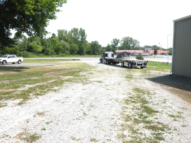 a swimming pool view with a outdoor seating space