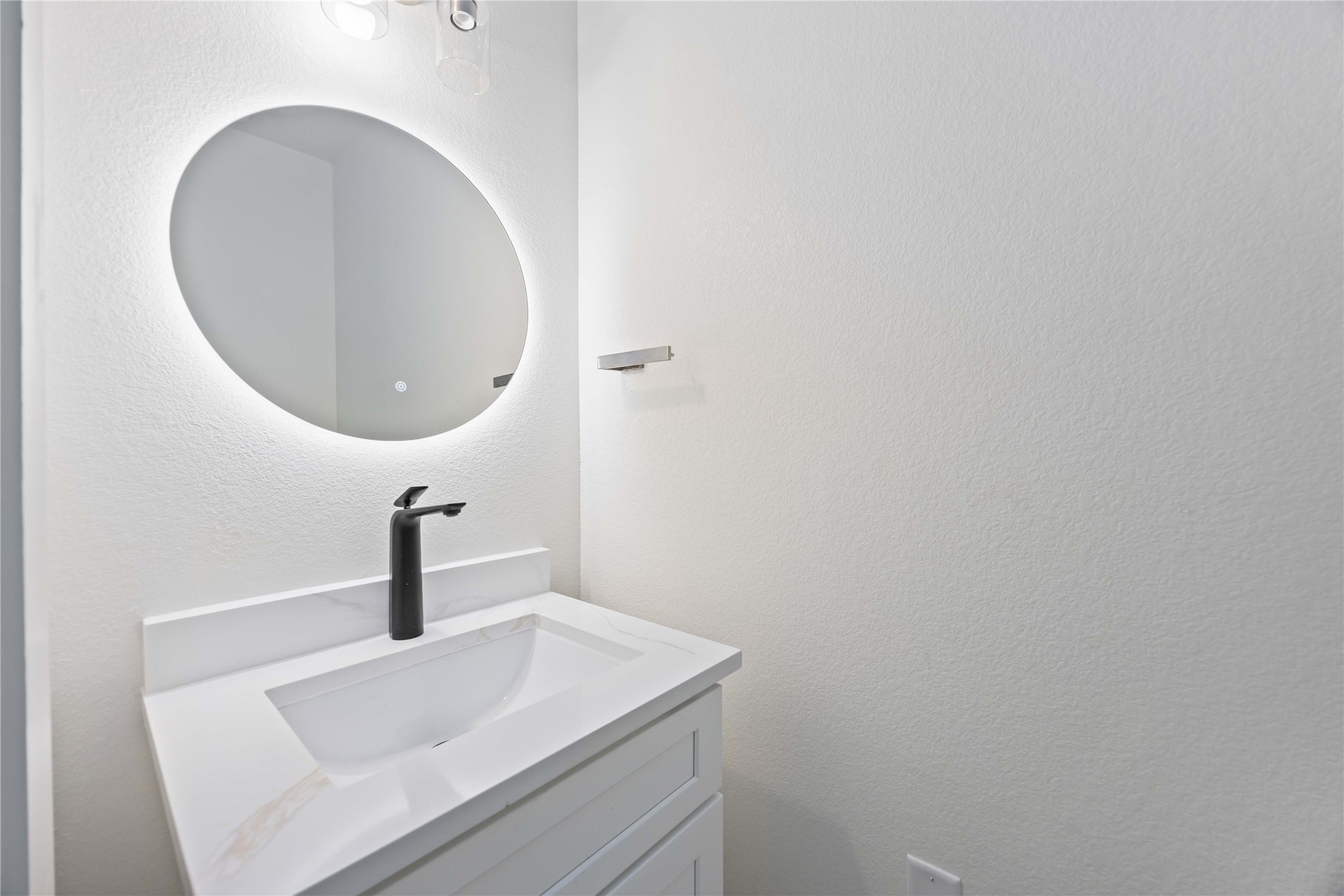 5222 Gold Street Houston, TX 77026 - Photo 14 of 28 a bathroom with a sink and mirror