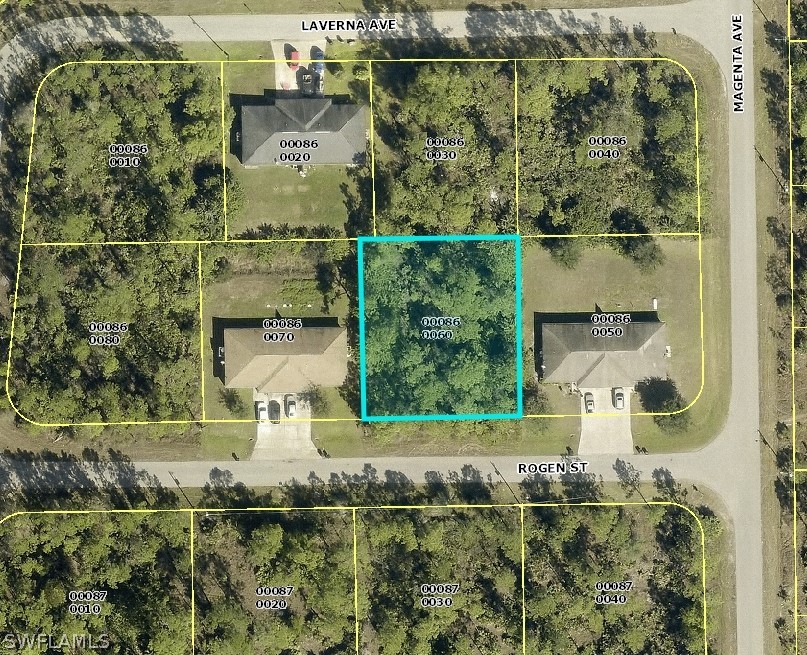 an aerial view of residential house with outdoor space