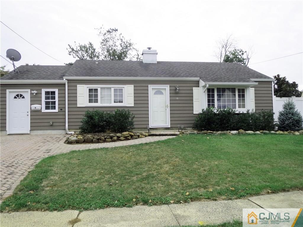 8 Sanders Road Edison, NJ 08817 - Photo 1 of 17 front view of a house and a yard