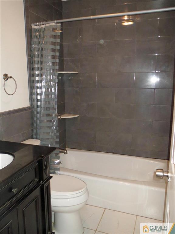 8 Sanders Road Edison, NJ 08817 - Photo 10 of 17 a bathroom with a granite countertop sink toilet and shower
