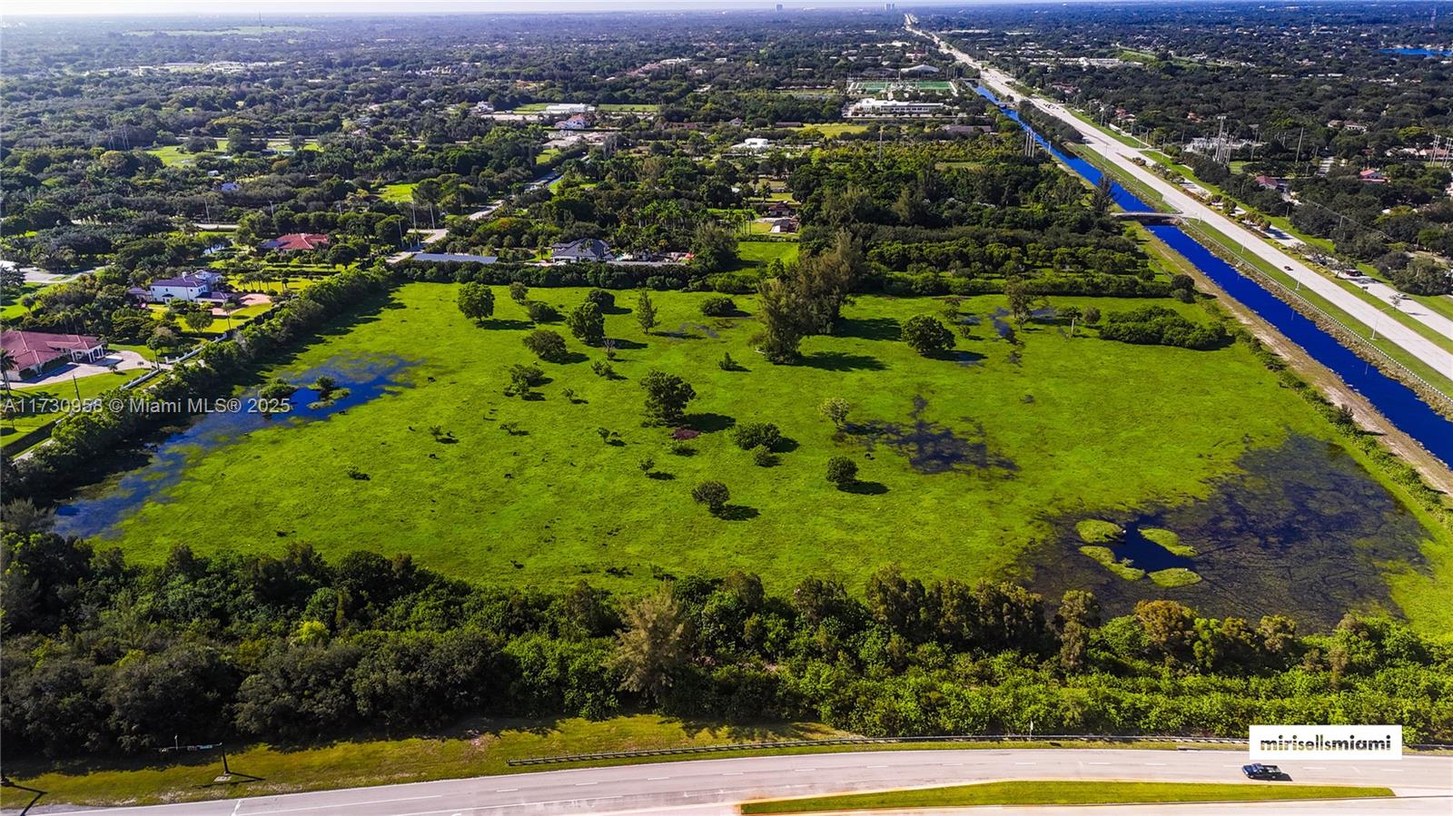 6701 Southwest 124th Ave Ranches Southwest Ranches, FL 33330 - Photo 3 of 10 an aerial view of residential houses with outdoor space and trees