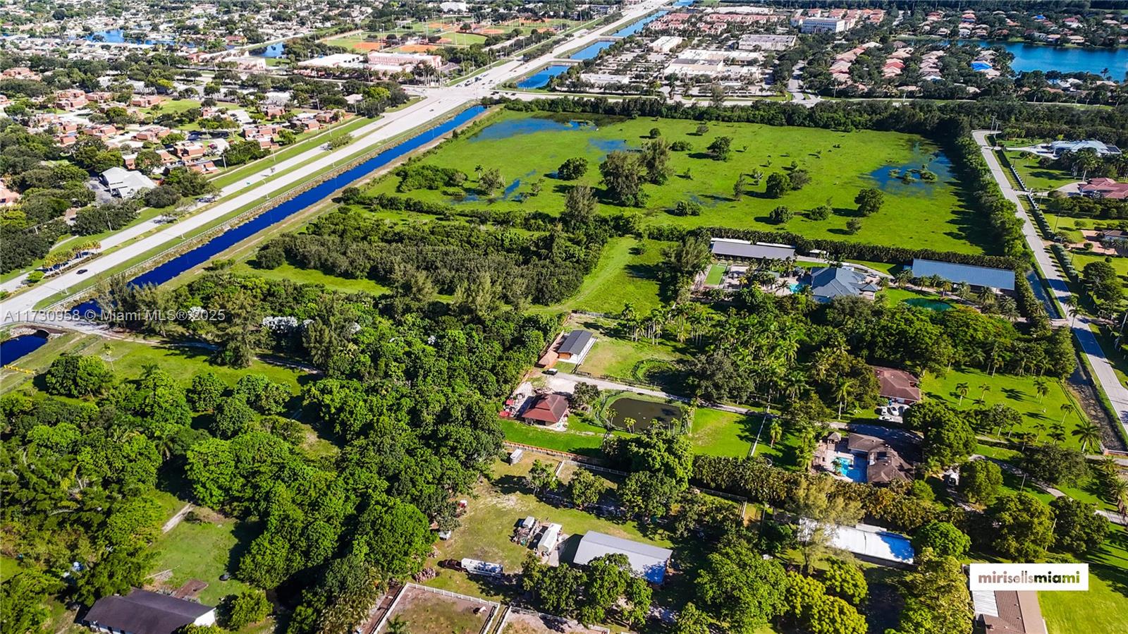 6701 Southwest 124th Ave Ranches Southwest Ranches, FL 33330 - Photo 6 of 10 an aerial view of a yard
