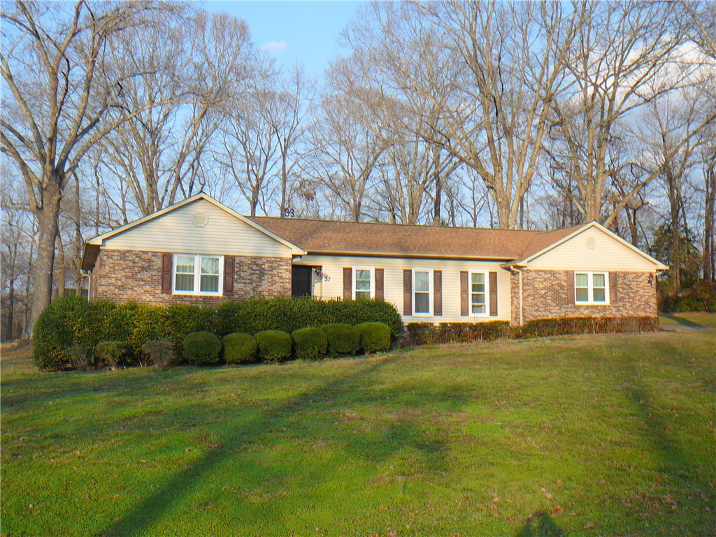 37 Camelia Circle Williamston, SC 29697 - Photo 2 of 25 A charming single-story residence with a welcoming facade set amidst a lush green lawn.