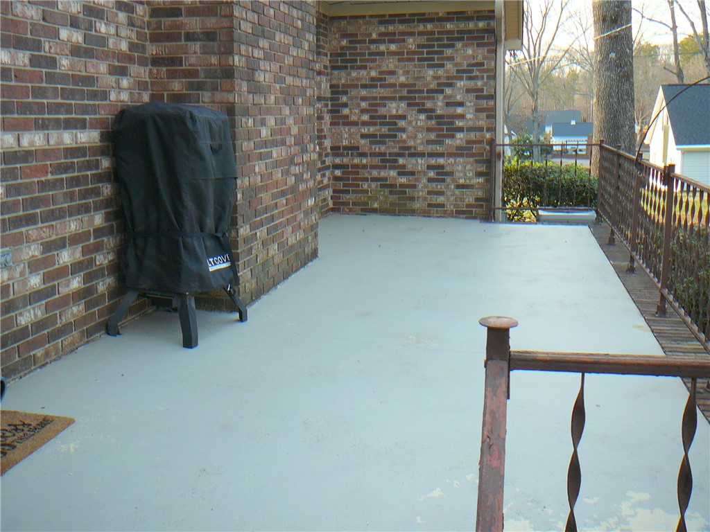 37 Camelia Circle Williamston, SC 29697 - Photo 21 of 25 This inviting patio area features a durable brick exterior, perfect for outdoor enjoyment.