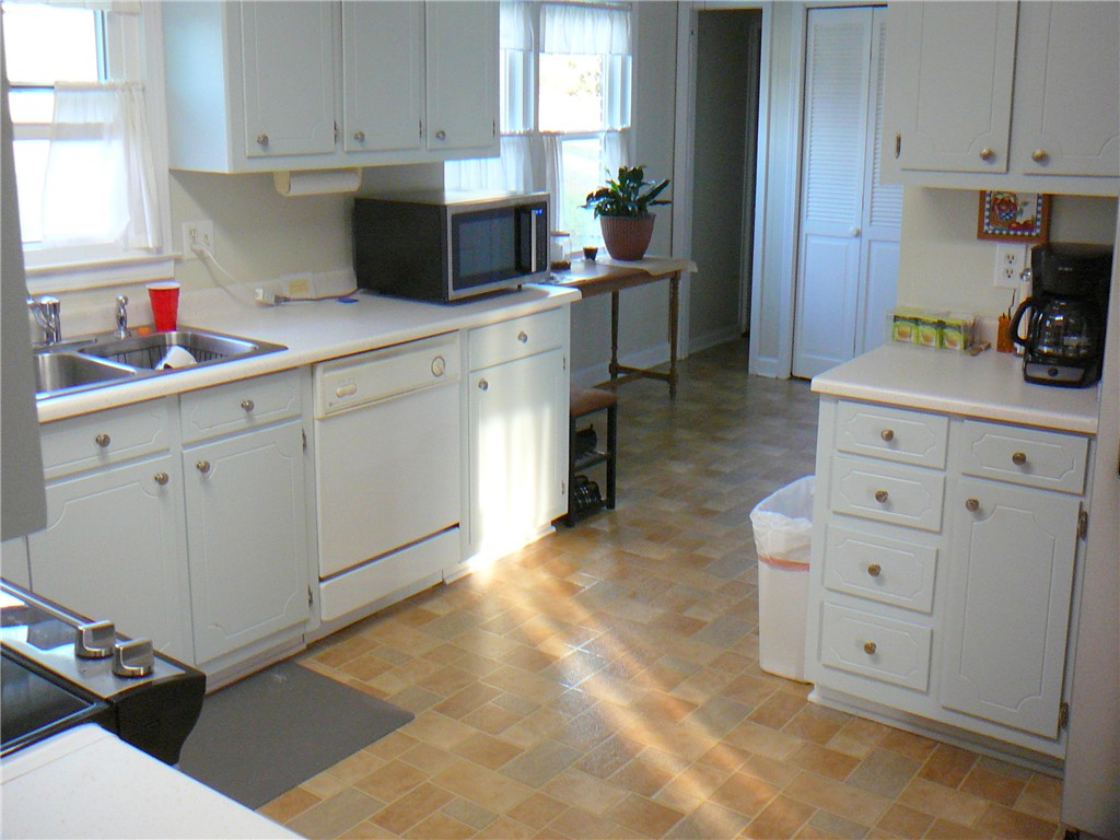 37 Camelia Circle Williamston, SC 29697 - Photo 10 of 25 This bright kitchen offers a practical layout with ample cabinetry and generous counter space.