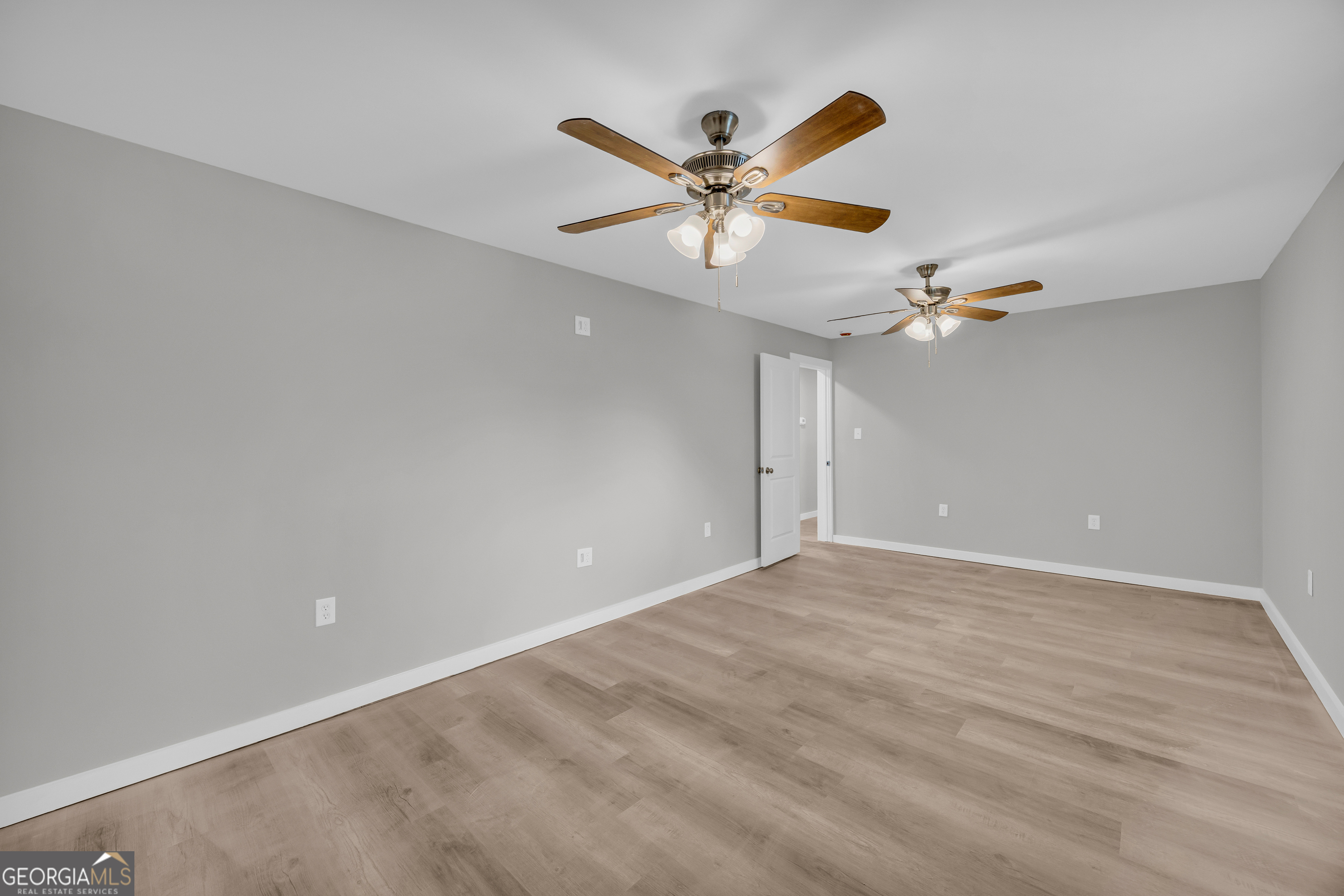 8606 Holly Springs Road Maysville, GA 30558 - Photo 63 of 74 a view of an empty room