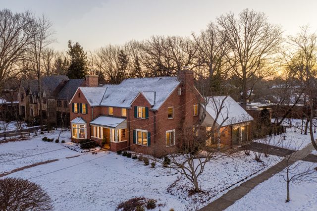 a view of a town with large trees