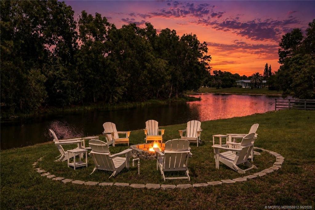 4401 Southeast Satinleaf Place Stuart, FL 34997 - Photo 3 of 51 Dreamy Views of the Lake from Firepit