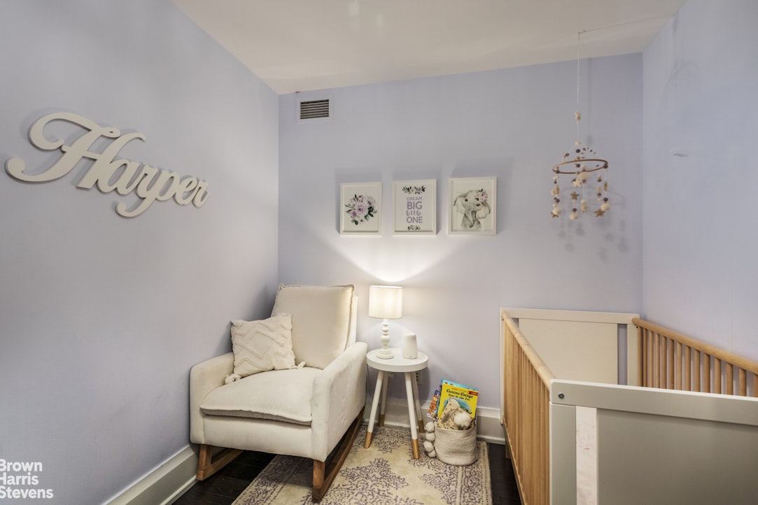 50 Riverside Boulevard, Unit 3H Manhattan, NY 10069 - Photo 10 of 21 a living room with a couch