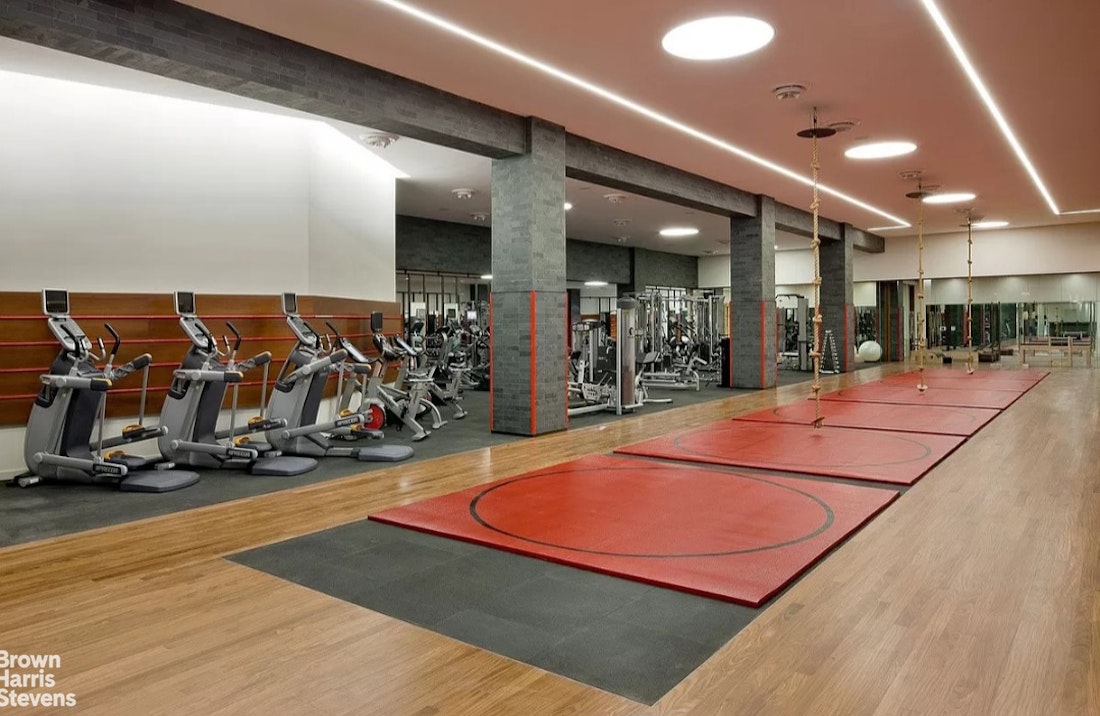 50 Riverside Boulevard, Unit 3H Manhattan, NY 10069 - Photo 13 of 21 a room with lots of gym equipment