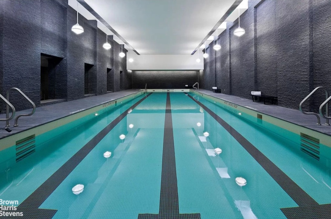 50 Riverside Boulevard, Unit 3H Manhattan, NY 10069 - Photo 14 of 21 a lobby with pool table and outdoor seating