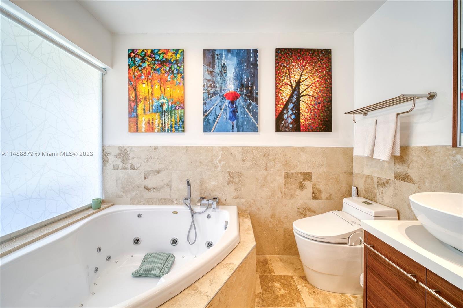 9904 Southwest 133rd Court Miami, FL 33186 - Photo 11 of 43 a bathroom with a bathtub sink and toilet