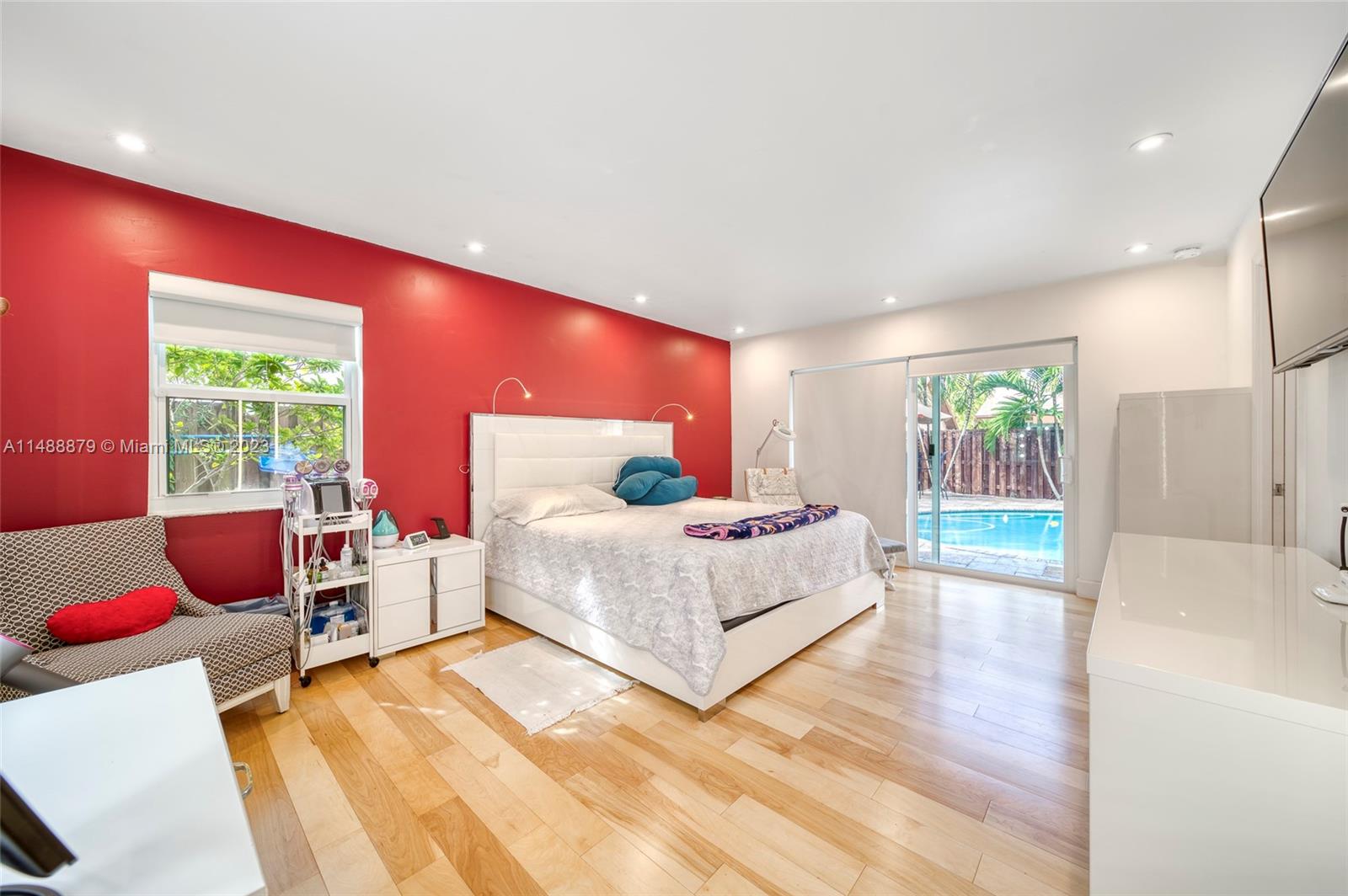 9904 Southwest 133rd Court Miami, FL 33186 - Photo 13 of 43 a bedroom with a bed and a couch
