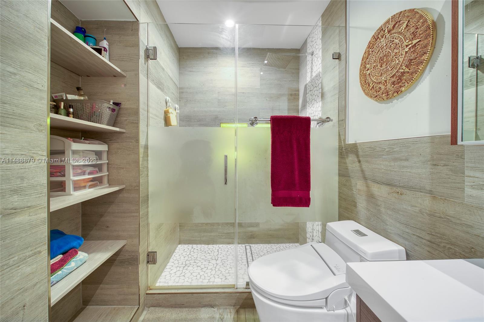 9904 Southwest 133rd Court Miami, FL 33186 - Photo 20 of 43 a bathroom with a toilet and a shower