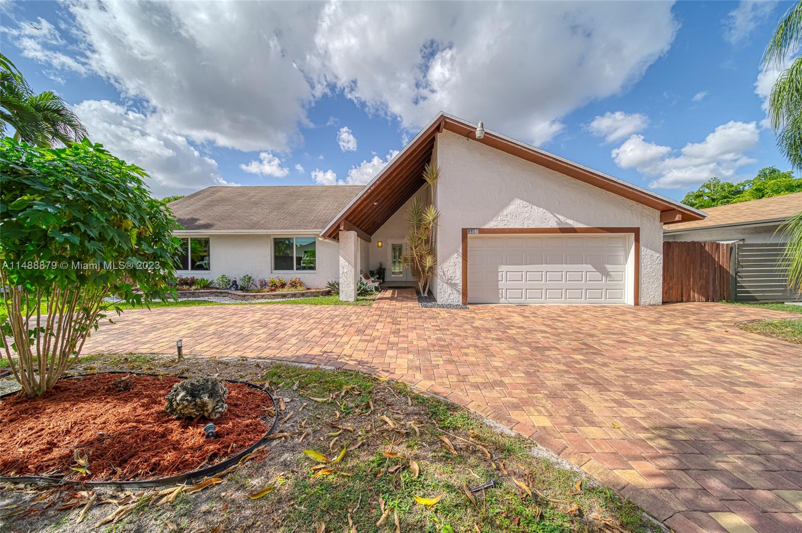 9904 Southwest 133rd Court Miami, FL 33186 - Photo 2 of 43 a house with a outdoor space