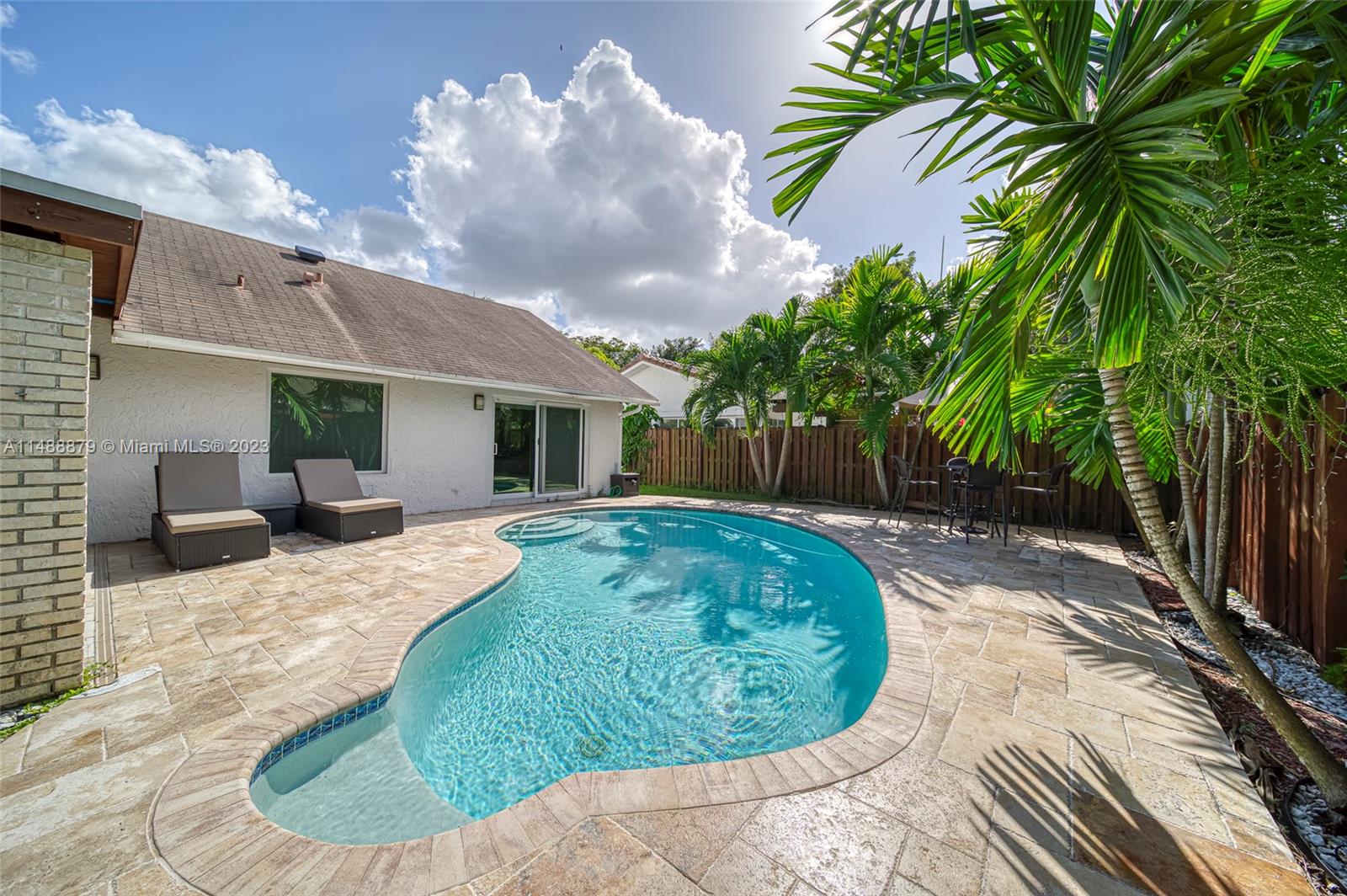 9904 Southwest 133rd Court Miami, FL 33186 - Photo 27 of 43 a view of a house with a patio