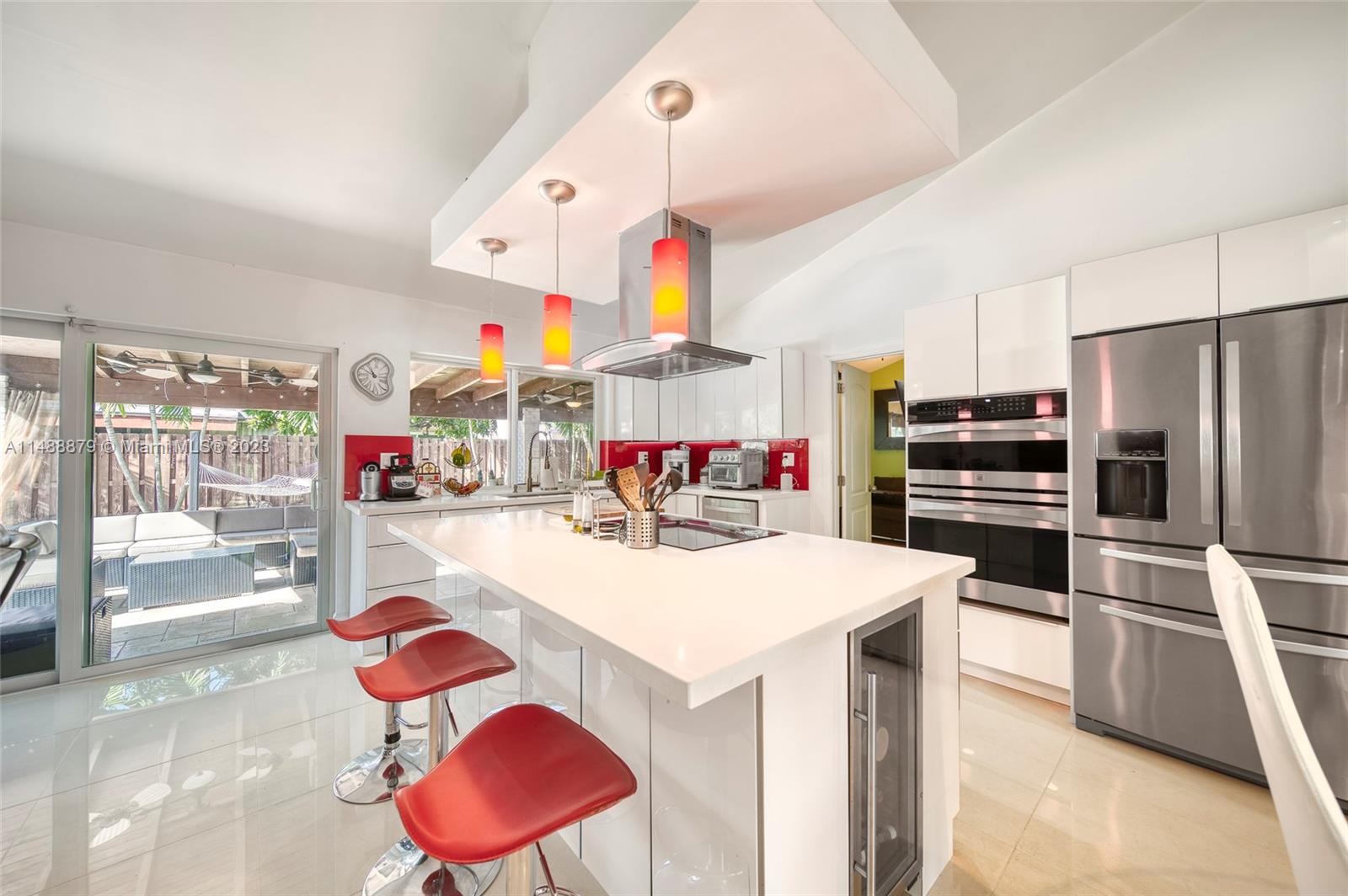 9904 Southwest 133rd Court Miami, FL 33186 - Photo 4 of 43 a kitchen with a sink cabinets and stainless steel appliances