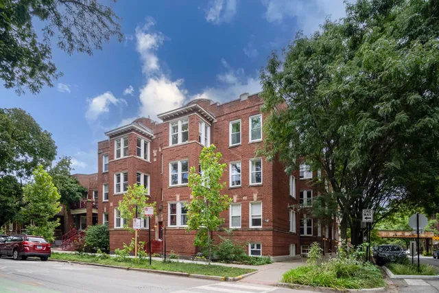 a front view of a multi story residential apartment buildings