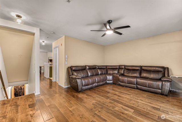 a bathroom with a sink toilet and a mirror