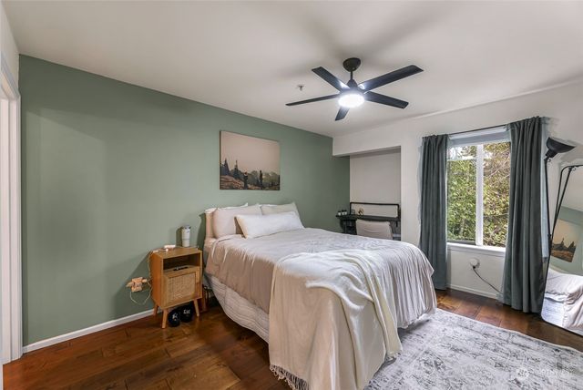 a view of livingroom with cabinet and window