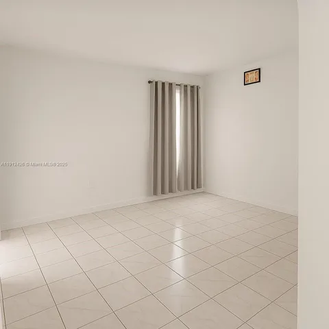 an empty room with an entryway