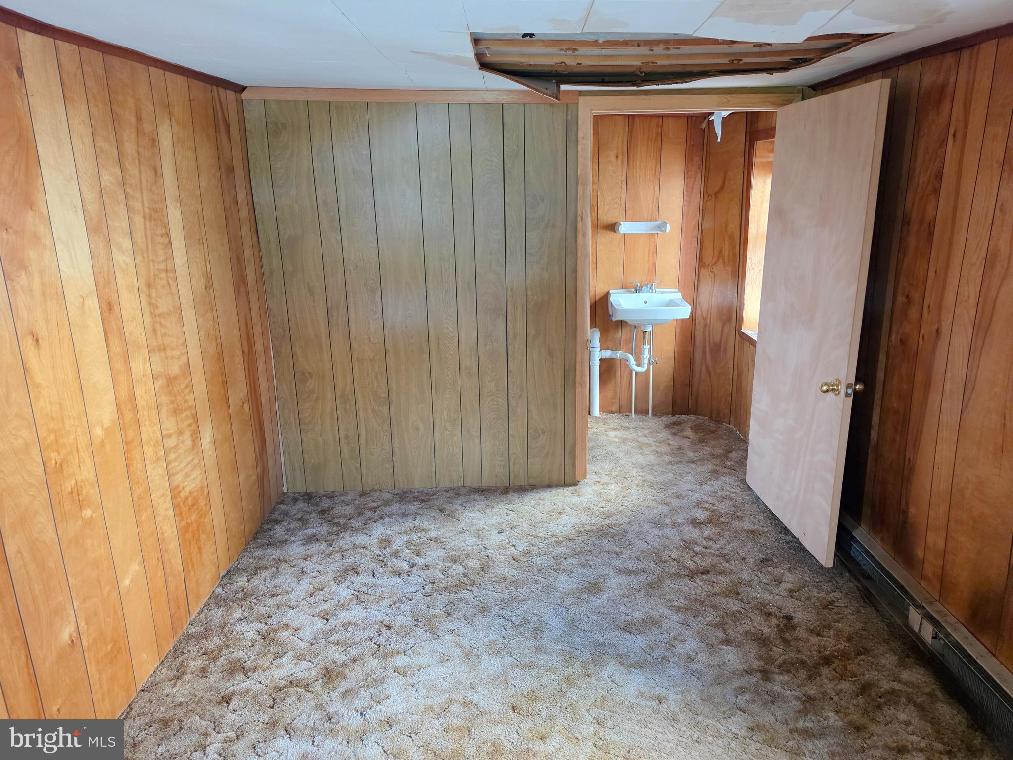 6018 Conover Road Taneytown, MD 21787 - Photo 4 of 18 a view of entryway with a small yard and a window