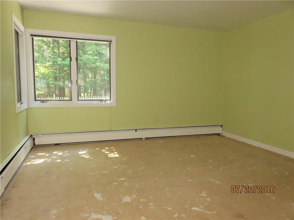 419 New Dam Road Waterboro, ME 04061 - Photo 11 of 19 Bedroom 1 on 1st floor offers a...