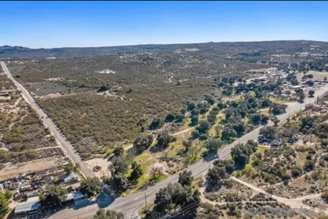 an aerial view of mountain with trees