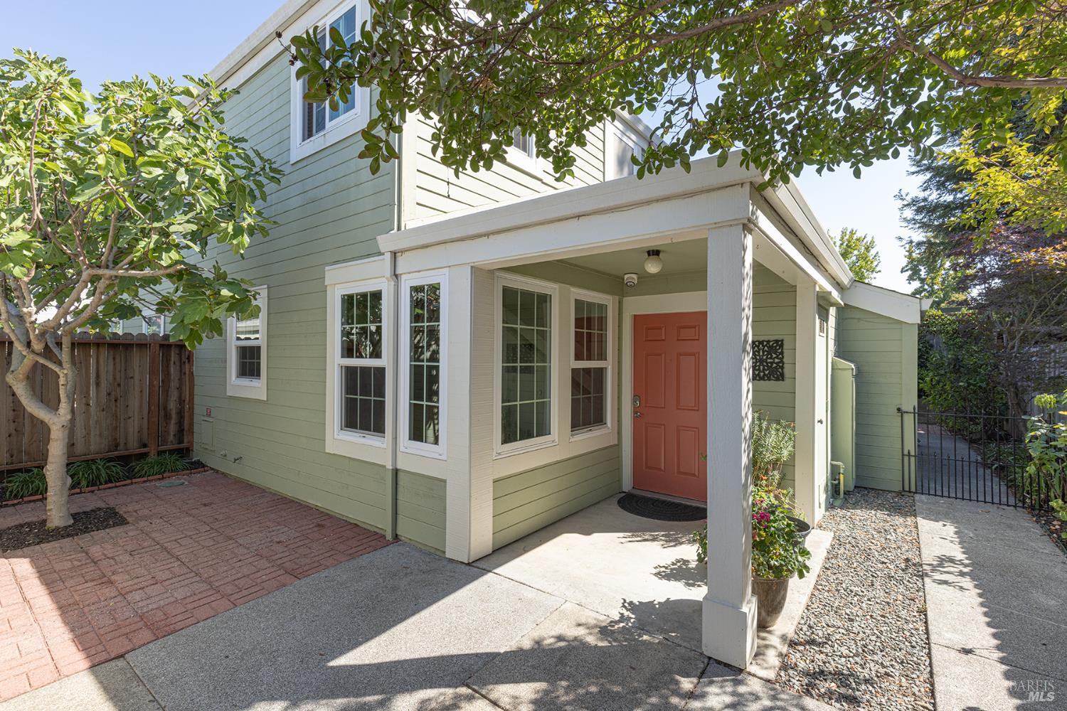2773 Elks Way Napa, CA 94558 - Photo 1 of 39 a view of a house with a large window and wooden fence