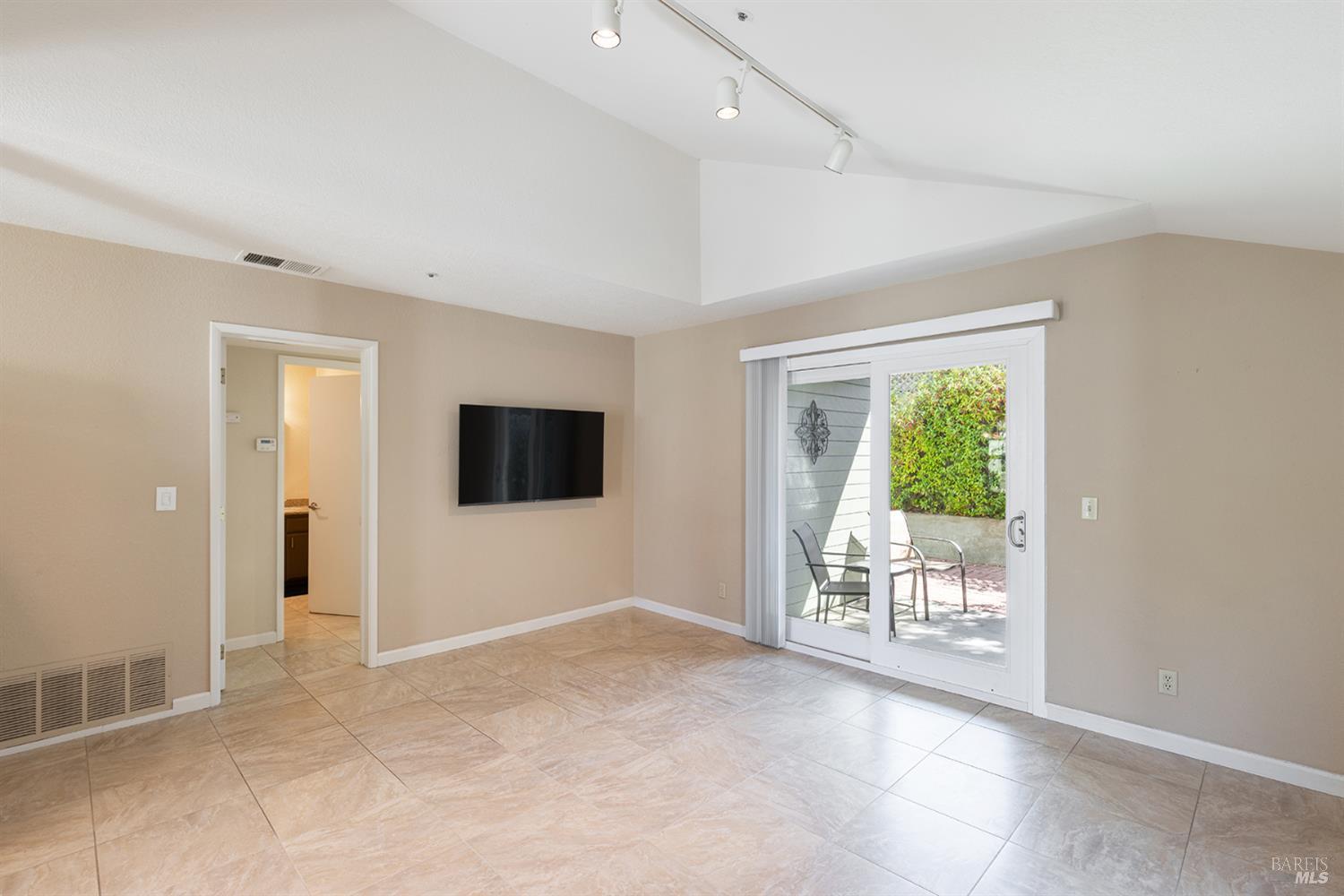 2773 Elks Way Napa, CA 94558 - Photo 11 of 39 a view of a livingroom with an empty space and a window