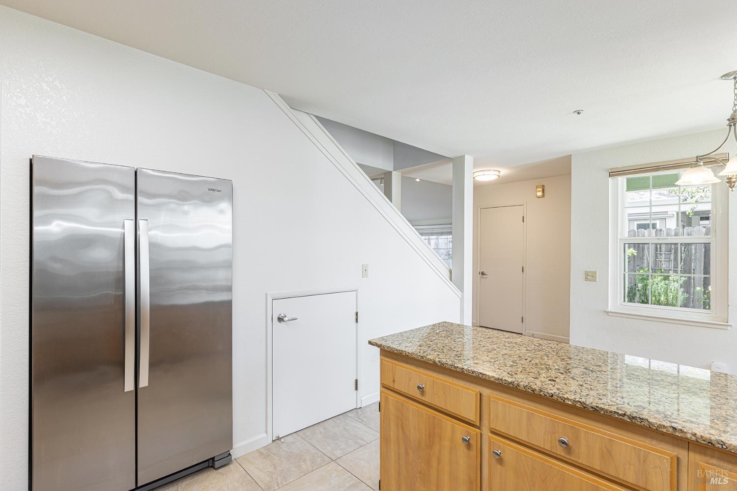 2773 Elks Way Napa, CA 94558 - Photo 17 of 39 a bathroom with a granite countertop sink and a mirror