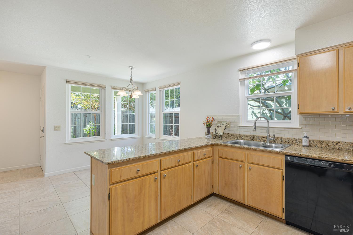 2773 Elks Way Napa, CA 94558 - Photo 18 of 39 a kitchen with a sink stove and window