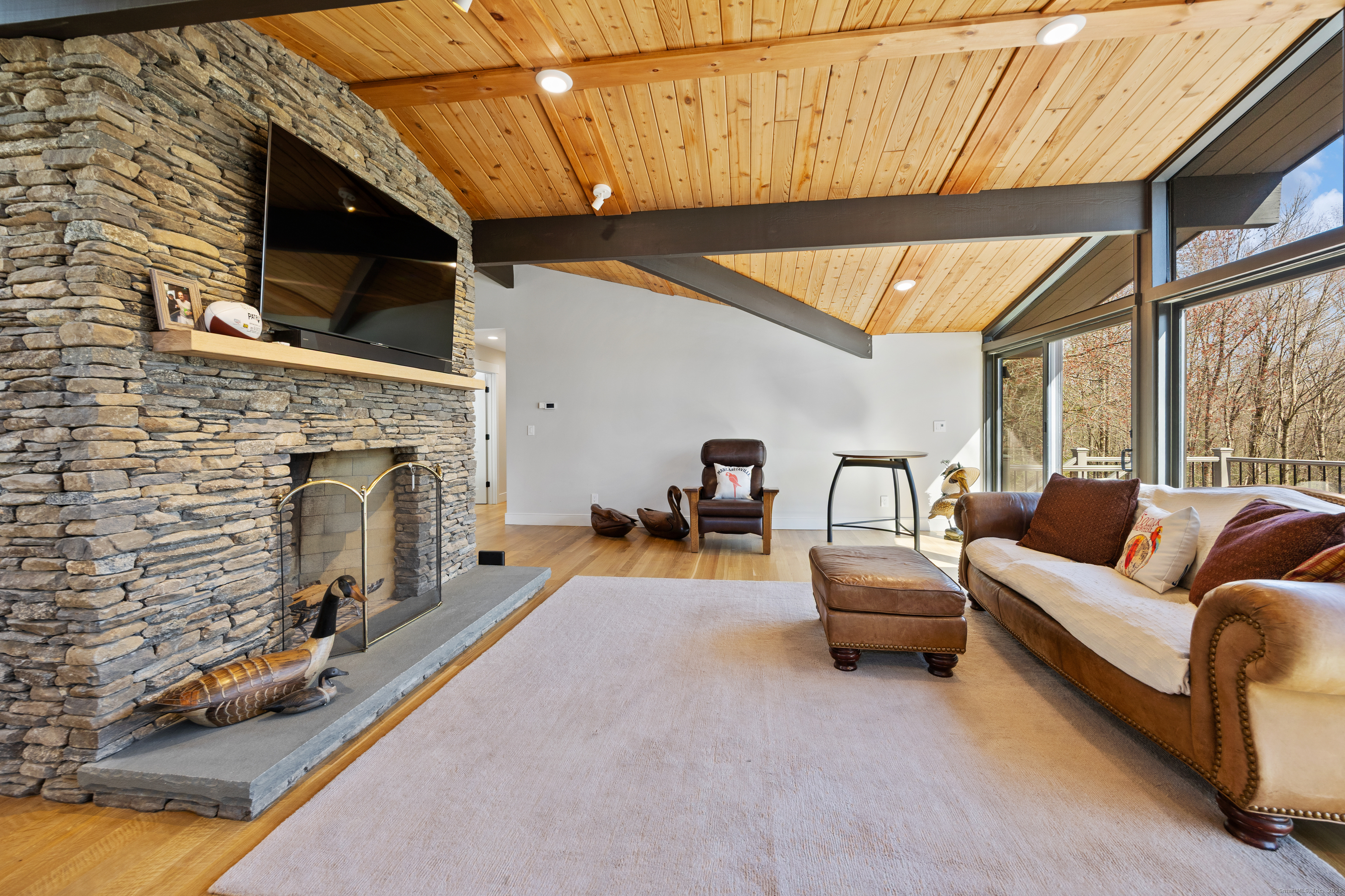 187 Sherbrook Drive Goshen, CT 06756 - Photo 13 of 39 a living room with furniture and a fireplace
