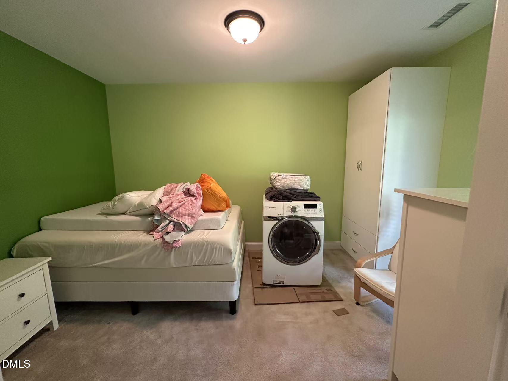1056 Indigo Ridge Place Cary, NC 27519 - Photo 28 of 33 a utility room with dryer and washer