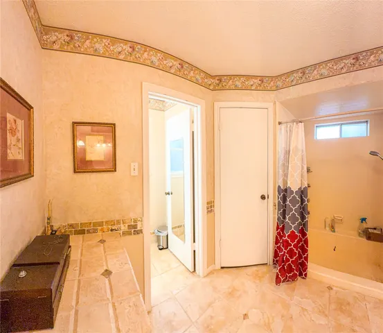 a view of a bathroom with a shower