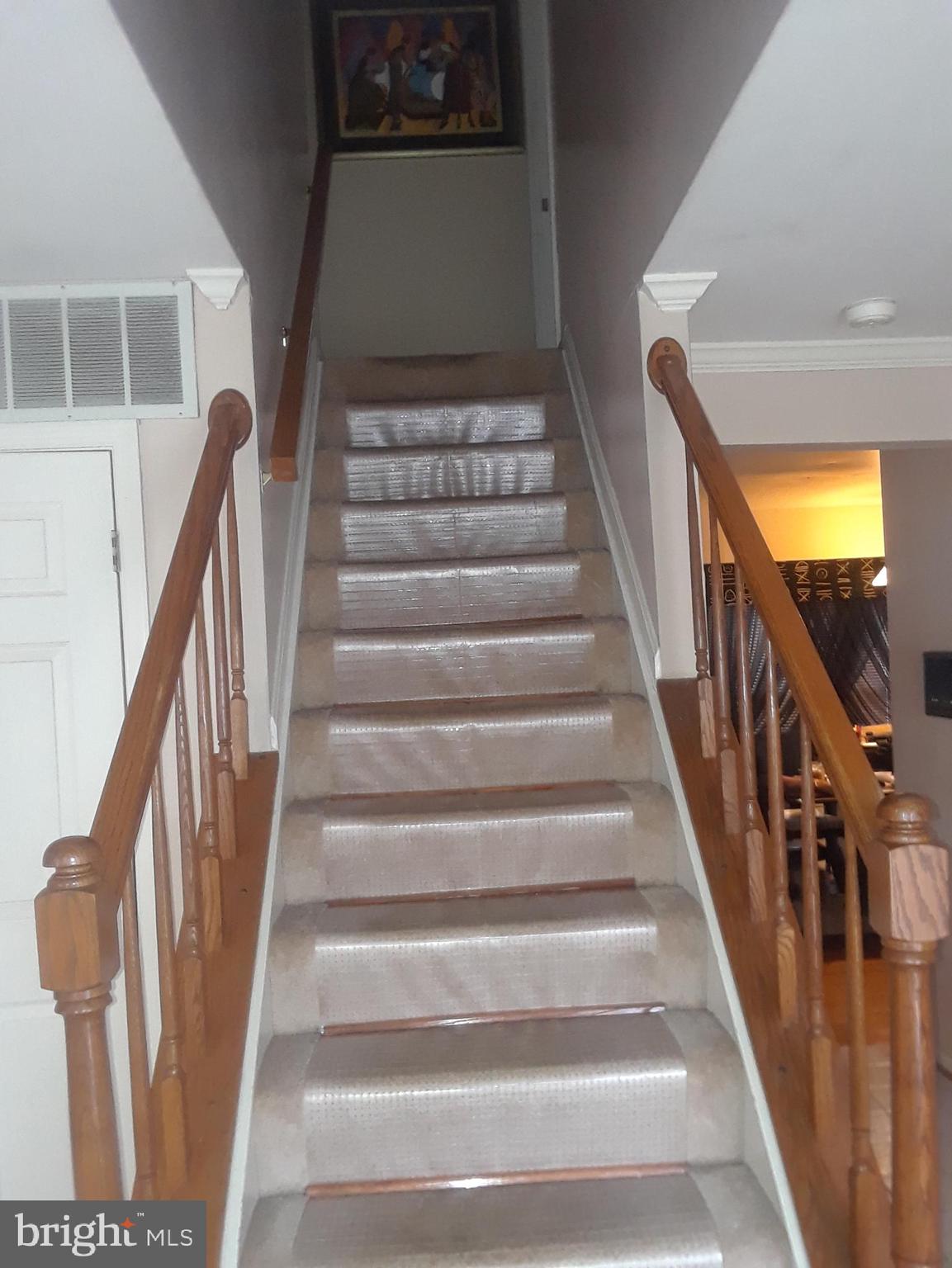 1317 Kingsbury Drive Bowie, MD 20721 - Photo 12 of 27 Stairs to upper level from main floor