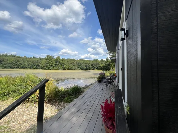 a view of swimming pool from a balcony