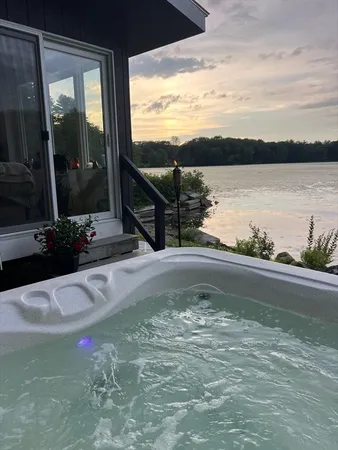 a view of a water fountain and a floor to ceiling window