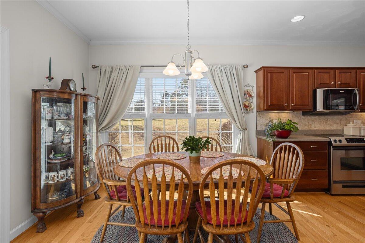 360 Maple Ridge Lane Fincastle, VA 24090 - Photo 12 of 77 a view of a dining room with furniture window and wooden floor