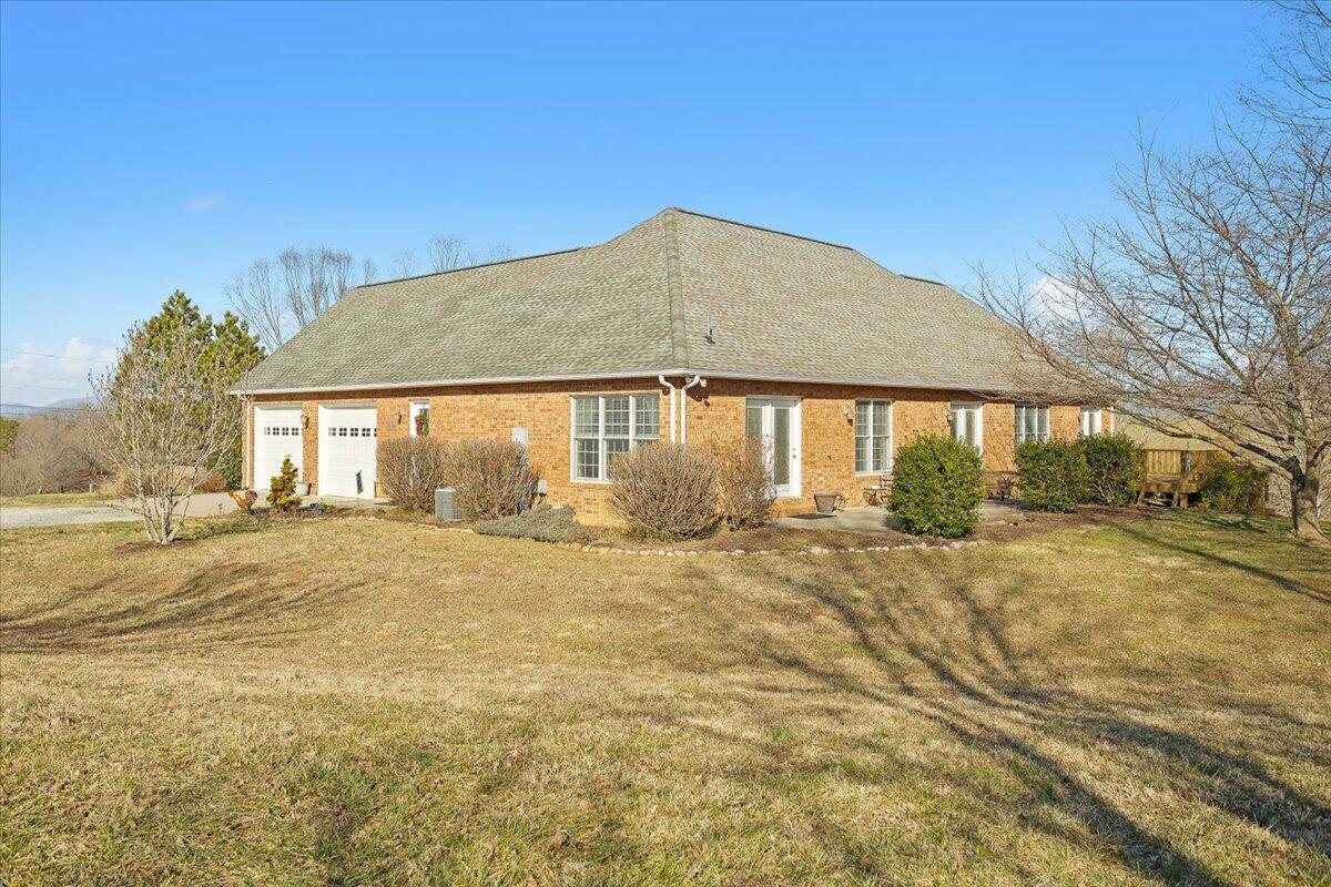 360 Maple Ridge Lane Fincastle, VA 24090 - Photo 14 of 77 a house with yard in front of it