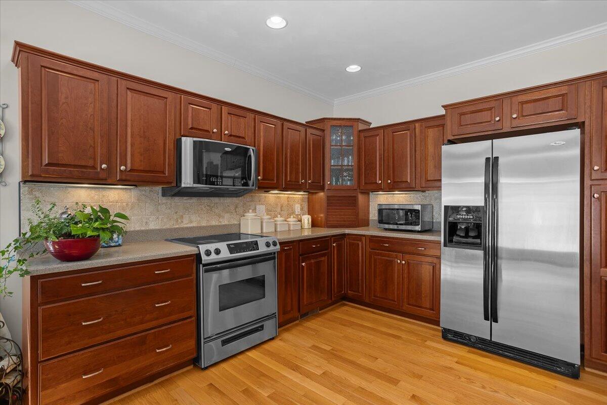 360 Maple Ridge Lane Fincastle, VA 24090 - Photo 16 of 77 a kitchen with stainless steel appliances granite countertop a refrigerator stove and microwave