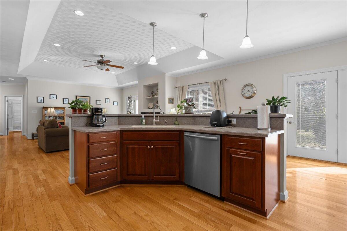360 Maple Ridge Lane Fincastle, VA 24090 - Photo 17 of 77 a kitchen with stainless steel appliances granite countertop a sink a stove and a wooden floors