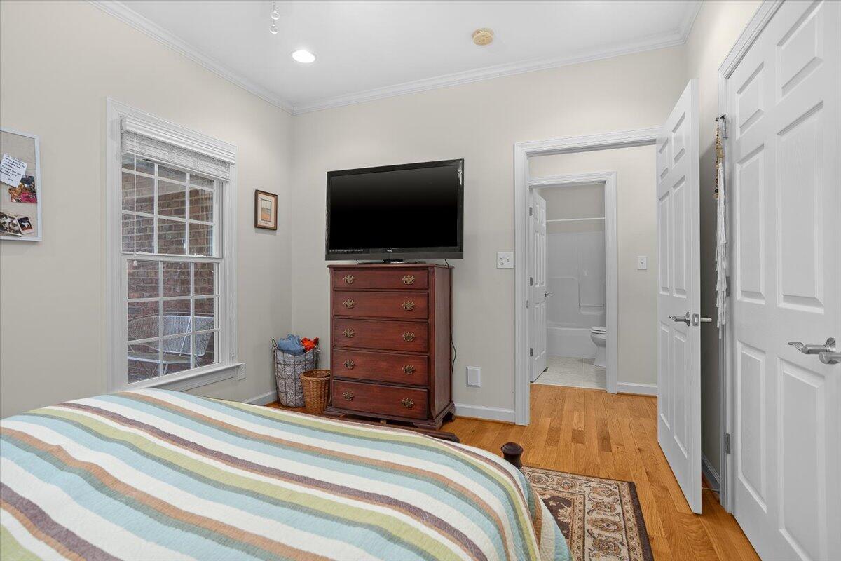 360 Maple Ridge Lane Fincastle, VA 24090 - Photo 25 of 77 a bedroom with a bed and a flat screen tv
